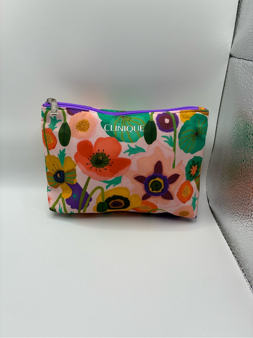 Clinique Pink Floral Cosmetic Pouch with Multicolor Bloom Print